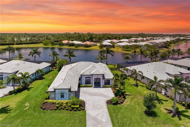 a aerial view of a house with city view