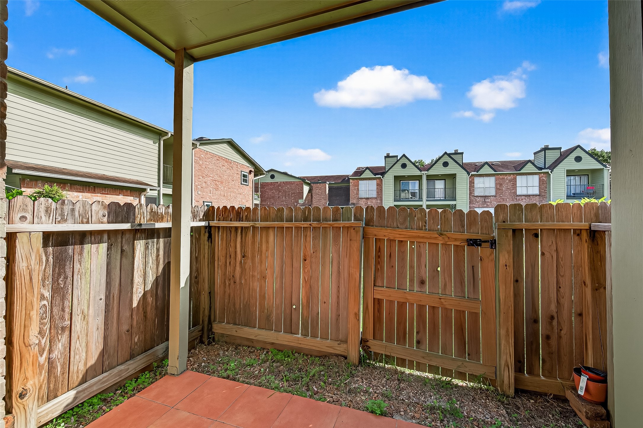 18800 Egret Bay Boulevard, Unit 1207 Webster, TX 77058 - Photo 26 of 30 a view of a house with iron fence