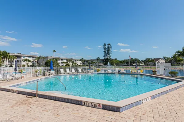 a view of a swimming pool and outdoor space