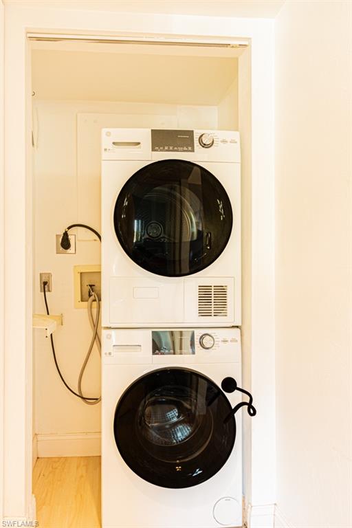 1022 Manatee Road, Unit D107 Naples, FL 34114 - Photo 22 of 43 a utility room with dryer and washer