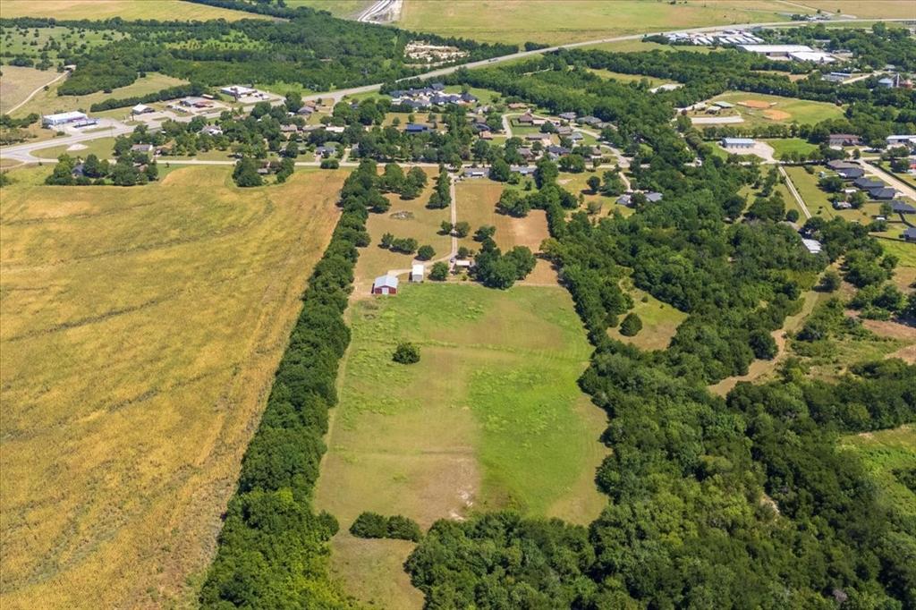 705 West Saunders Street Trenton, TX 75490 - Photo 35 of 37 an aerial view of residential houses with outdoor space