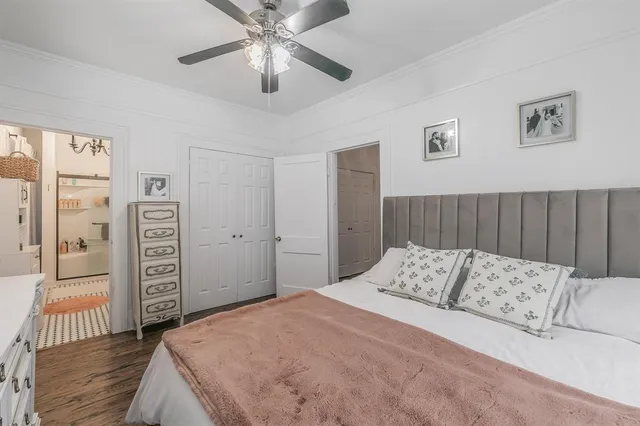a bathroom with a sink toilet and a mirror