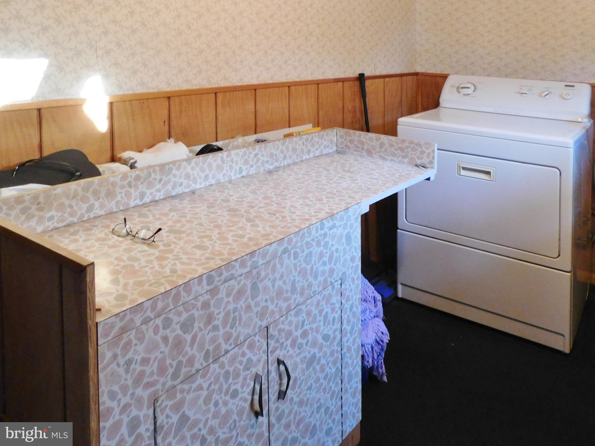 209 Delview Lane Delanco, NJ 08075 - Photo 36 of 42 Folding table in Laundryroom
