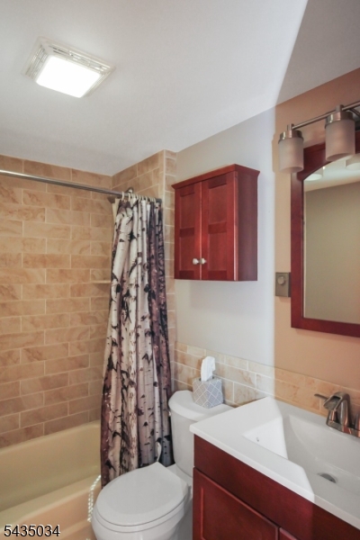 103 Petersburg Road Hackettstown, NJ 07840 - Photo 9 of 18 a bathroom with a sink a toilet and shower
