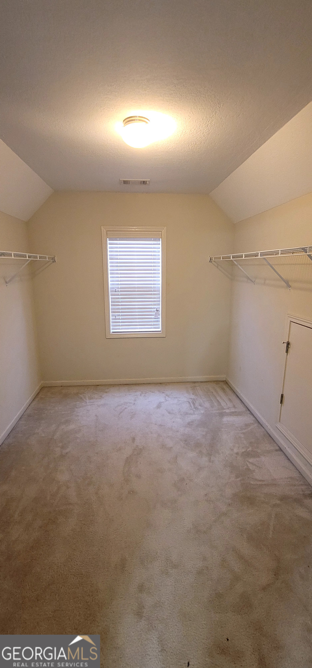 3181 Arbor Oaks Way Southwest Snellville, GA 30039 - Photo 4 of 12 an empty room with a empty space