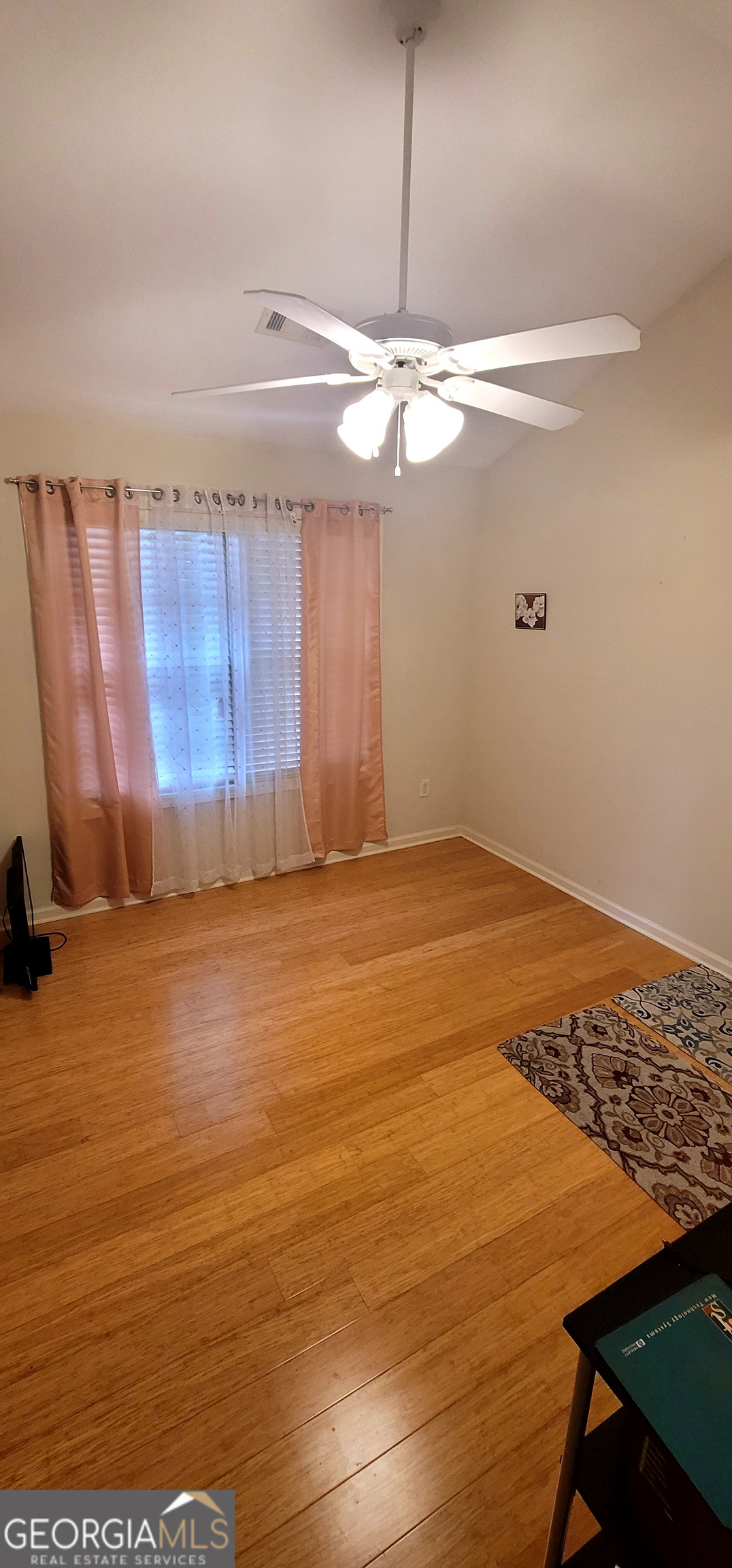3181 Arbor Oaks Way Southwest Snellville, GA 30039 - Photo 9 of 12 a view of an empty room with a window