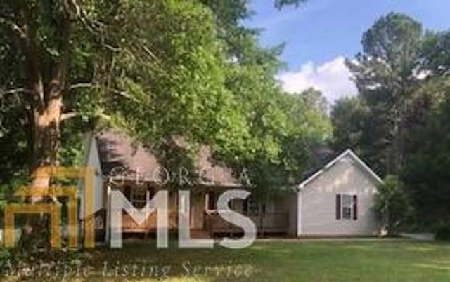 459 Weldon Lake Road Milner, GA 30257 - Photo 1 of 1 front view of a house with a yard