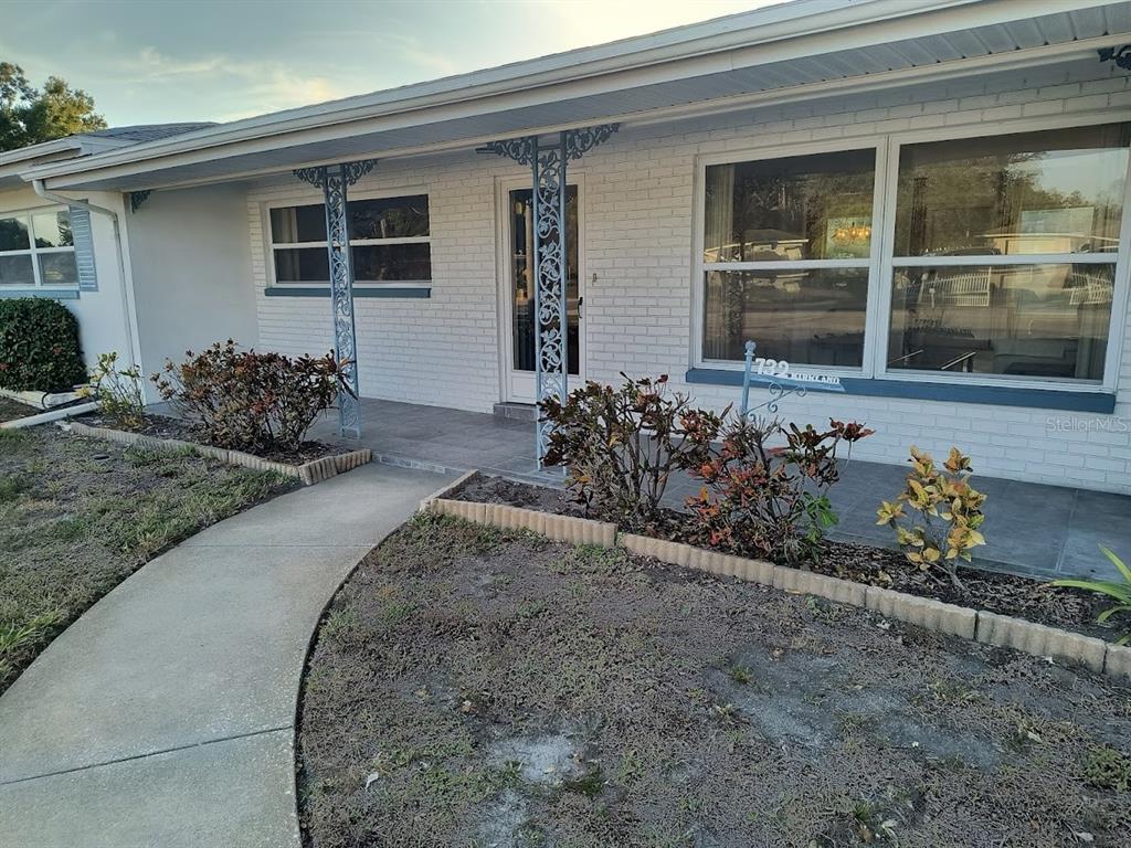 732 Keene Road Largo, FL 33771 - Photo 2 of 38 a front view of a house