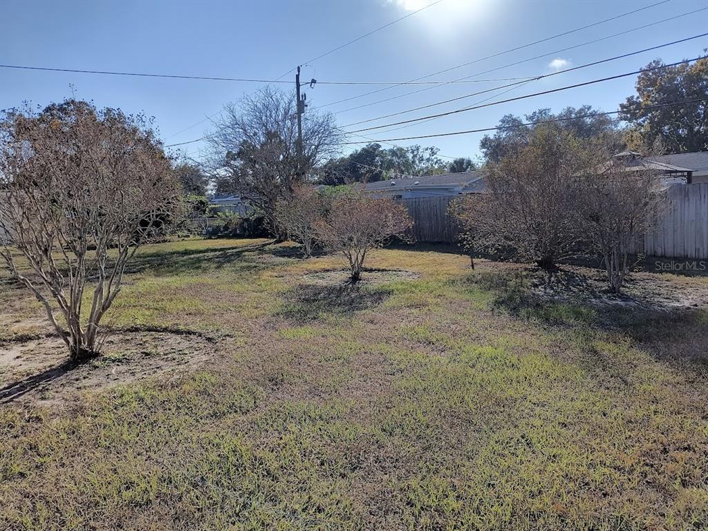 732 Keene Road Largo, FL 33771 - Photo 34 of 38 a view of a yard with an outdoor space