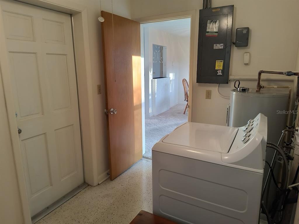 732 Keene Road Largo, FL 33771 - Photo 10 of 38 a utility room with dryer and washer