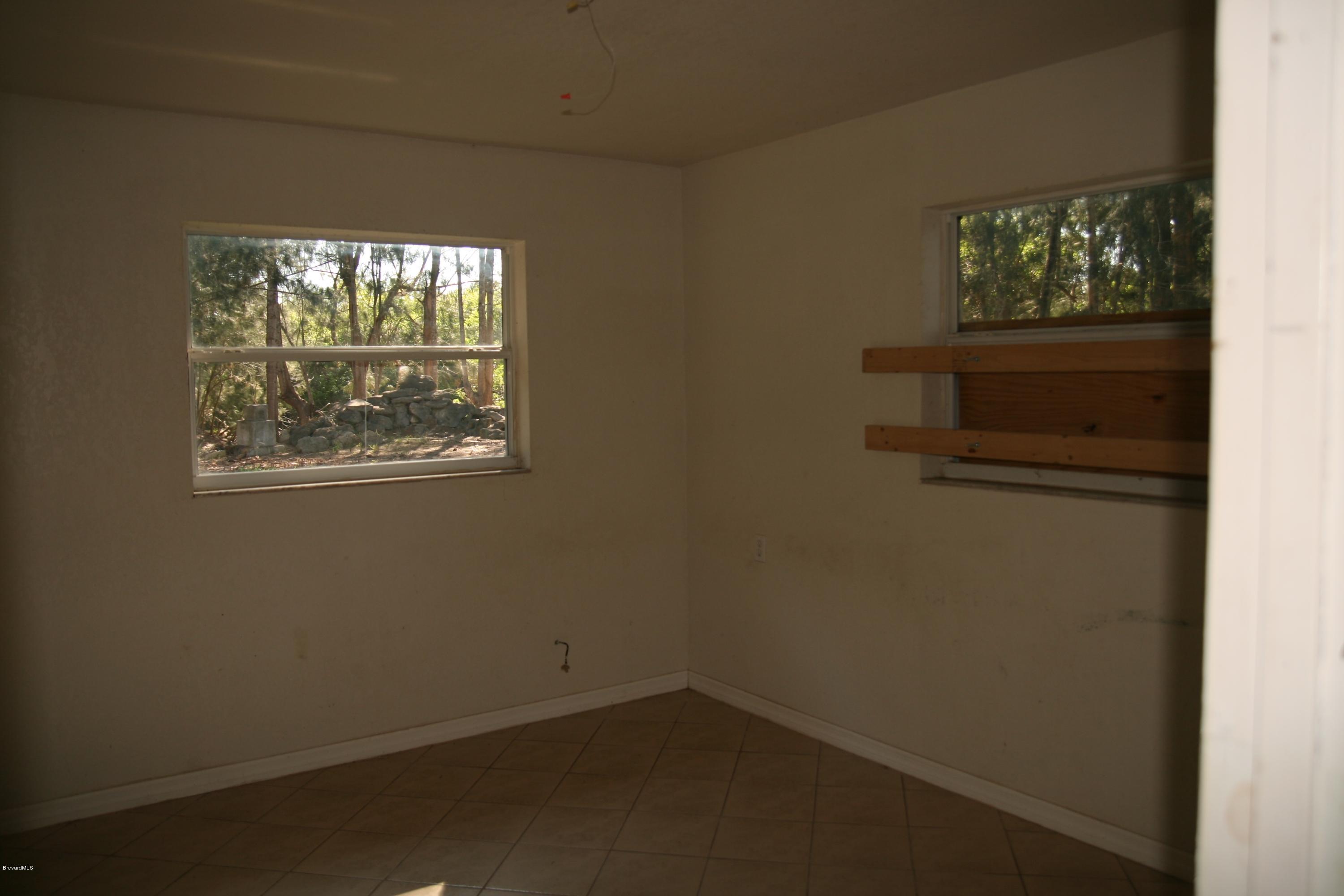 285 East Crisafulli Road Merritt Island, FL 32953 - Photo 13 of 25 back bedroom