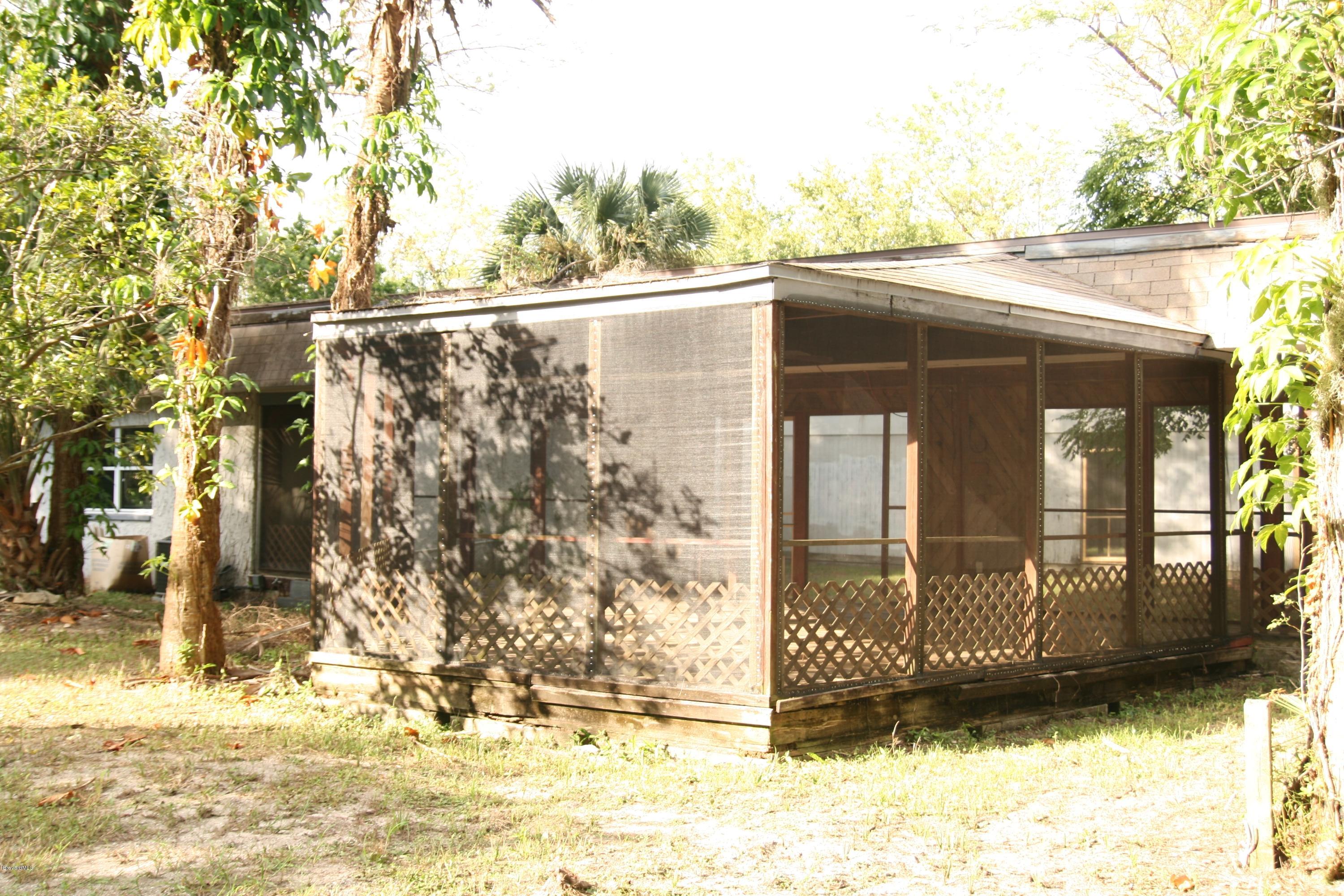 285 East Crisafulli Road Merritt Island, FL 32953 - Photo 15 of 25 Screened Porch exterior view