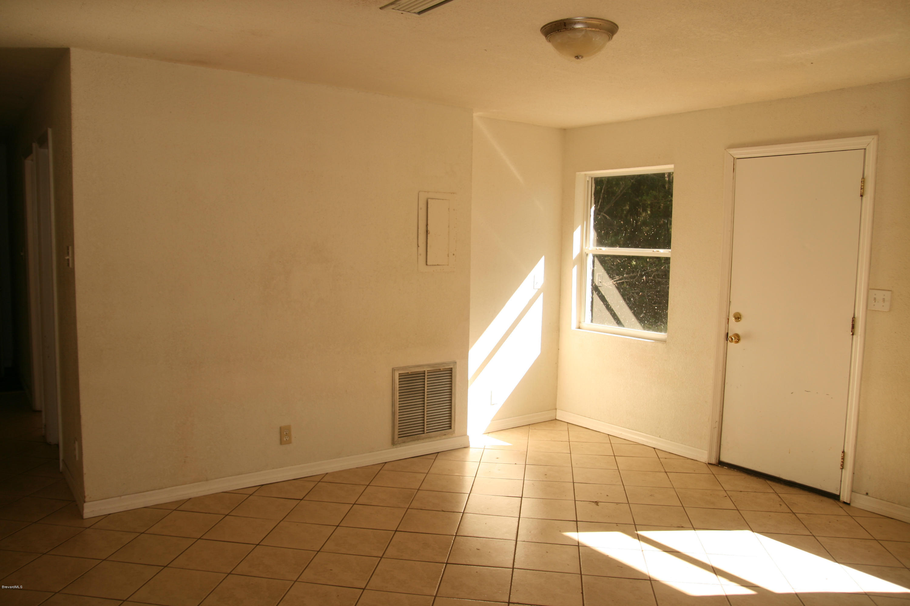 285 East Crisafulli Road Merritt Island, FL 32953 - Photo 5 of 25 entrance-living area