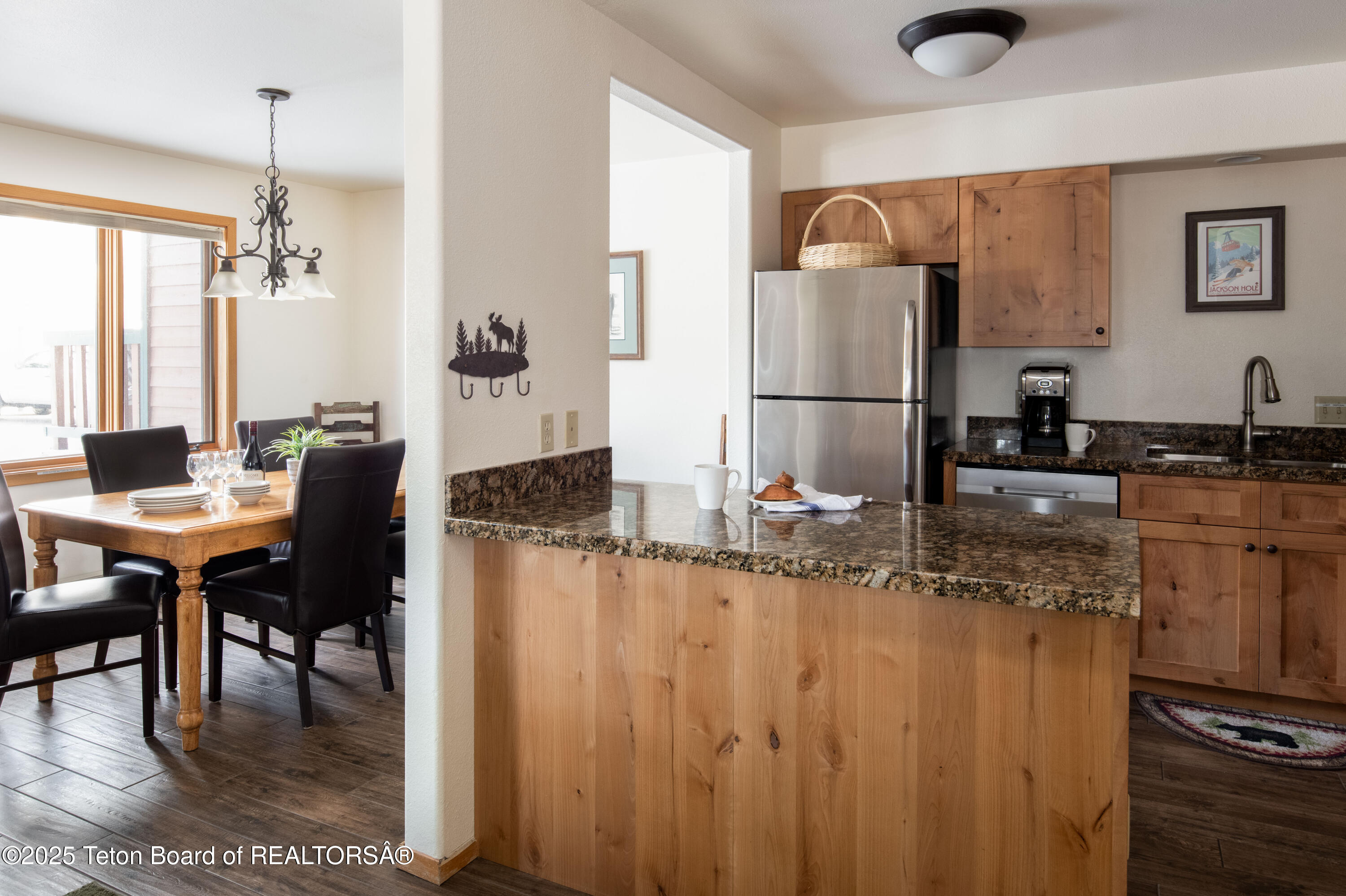 371 Snow King Loop Jackson, WY 83001 - Photo 8 of 22 Kitchen Island and Dining