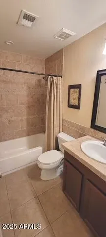 a bathroom with a sink a toilet and a bathtub