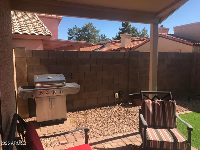 a view of balcony with furniture