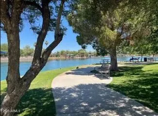 a view of swimming pool with an outdoor space and seating area