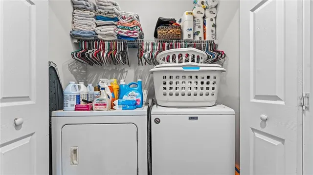 a utility room with dryer and washer