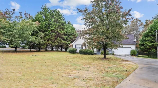a house with trees in front of it