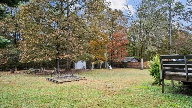 a view of a garden with a slide