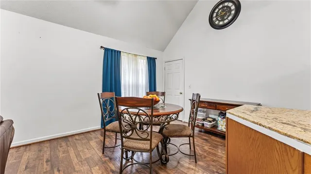 a view of a table and chairs in a room