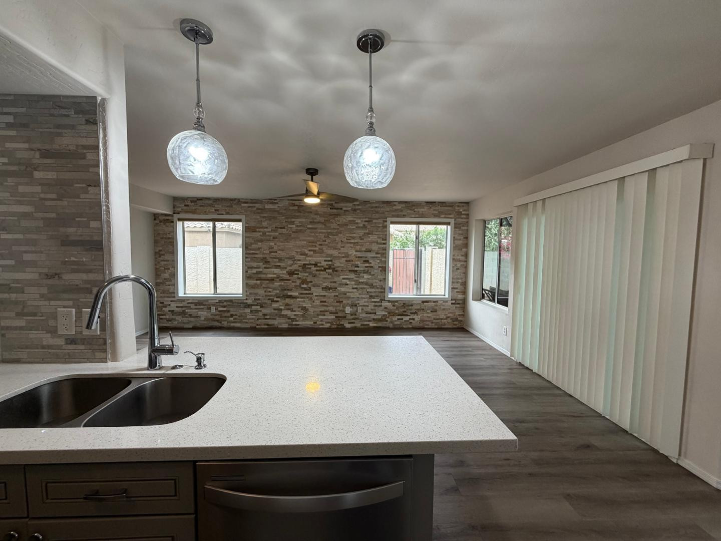 902 South Surfside Drive Gilbert, AZ 85233 - Photo 12 of 35 a view of a kitchen center a sink and dishwasher