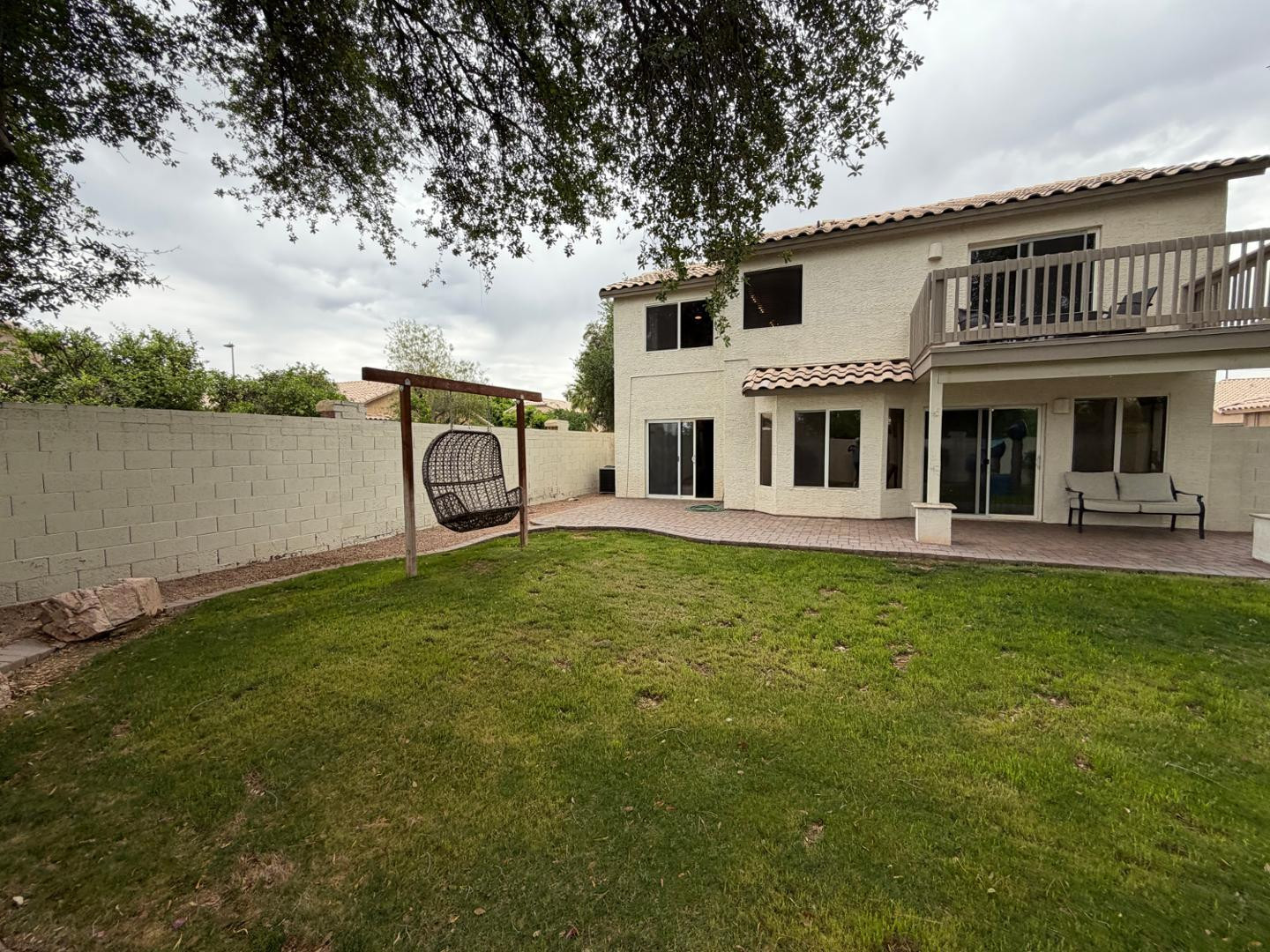 902 South Surfside Drive Gilbert, AZ 85233 - Photo 34 of 35 a front view of a house with garden