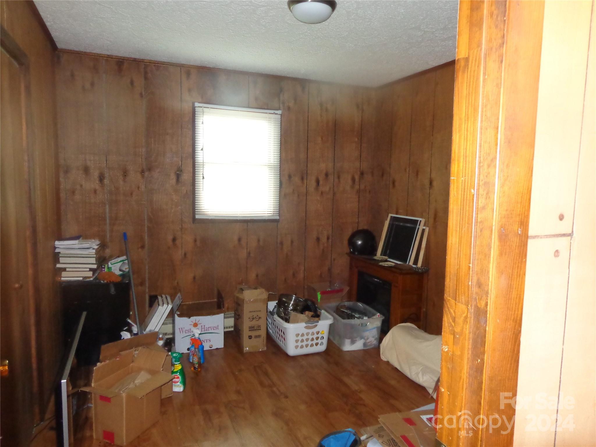981 Rufus Robinson Road Sylva, NC 28779 - Photo 11 of 27 a bathroom with a sink mirror and toilet