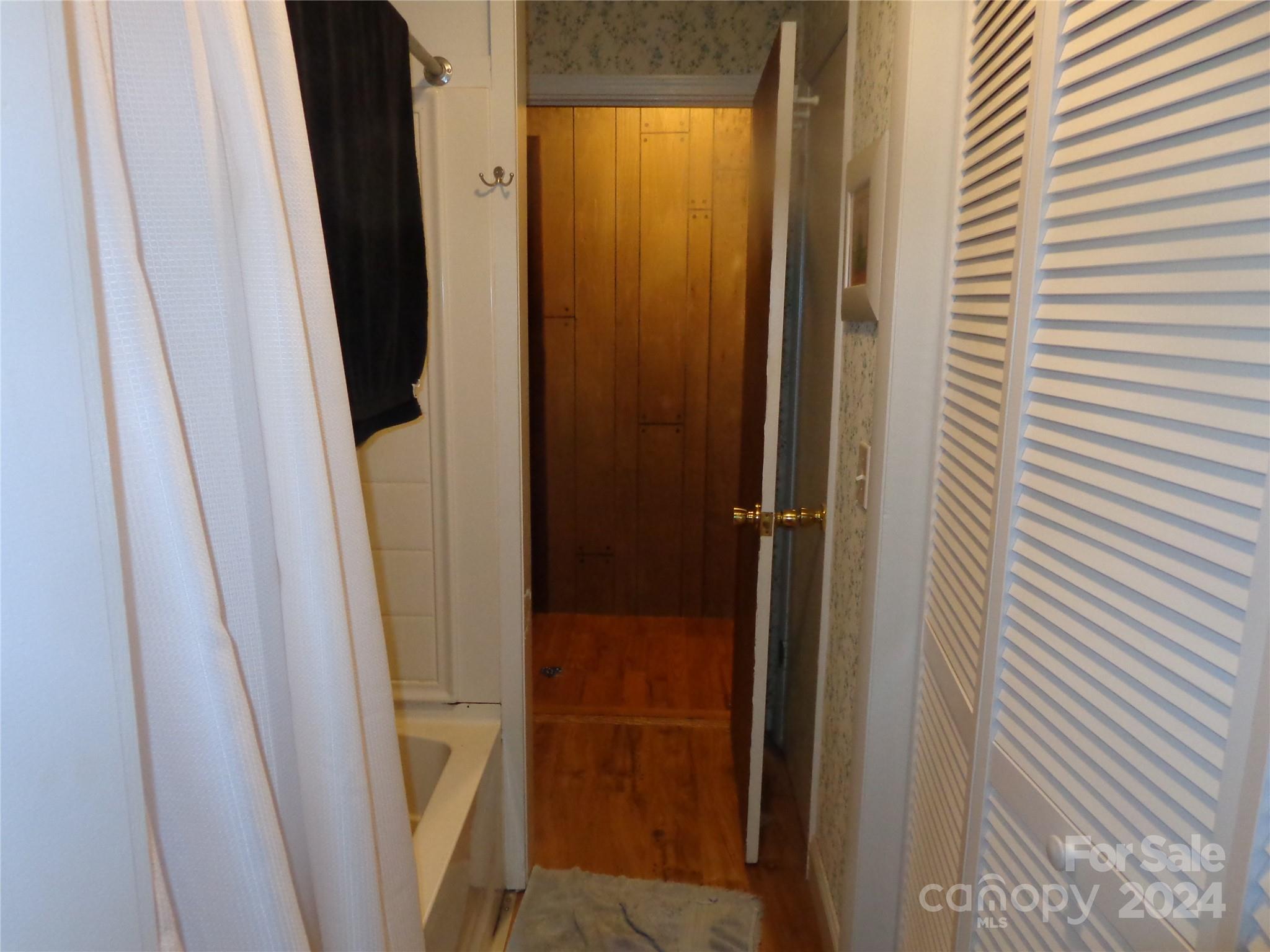 981 Rufus Robinson Road Sylva, NC 28779 - Photo 13 of 27 a bathroom with a glass door shower