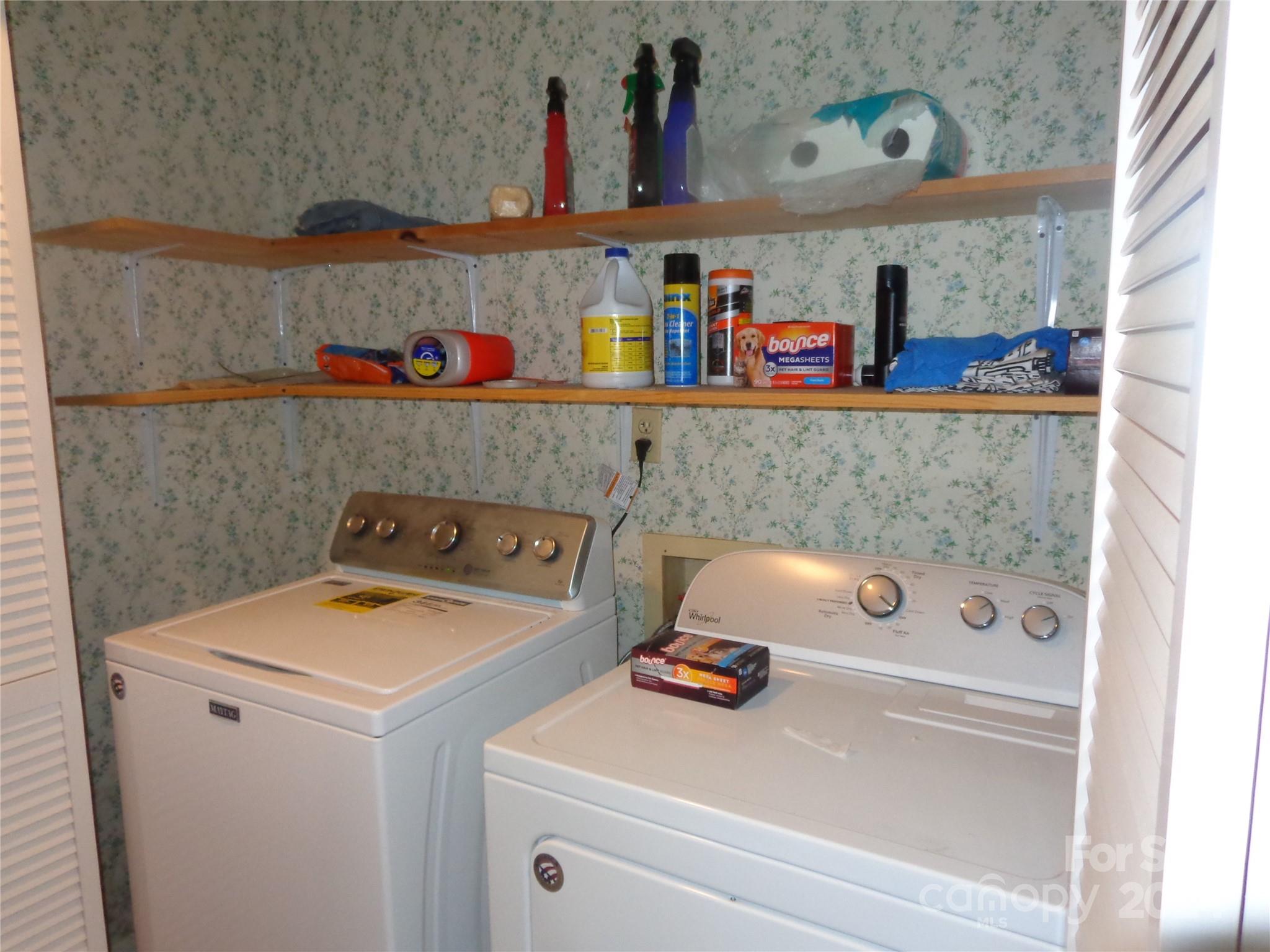 981 Rufus Robinson Road Sylva, NC 28779 - Photo 14 of 27 a utility room with dryer and washer