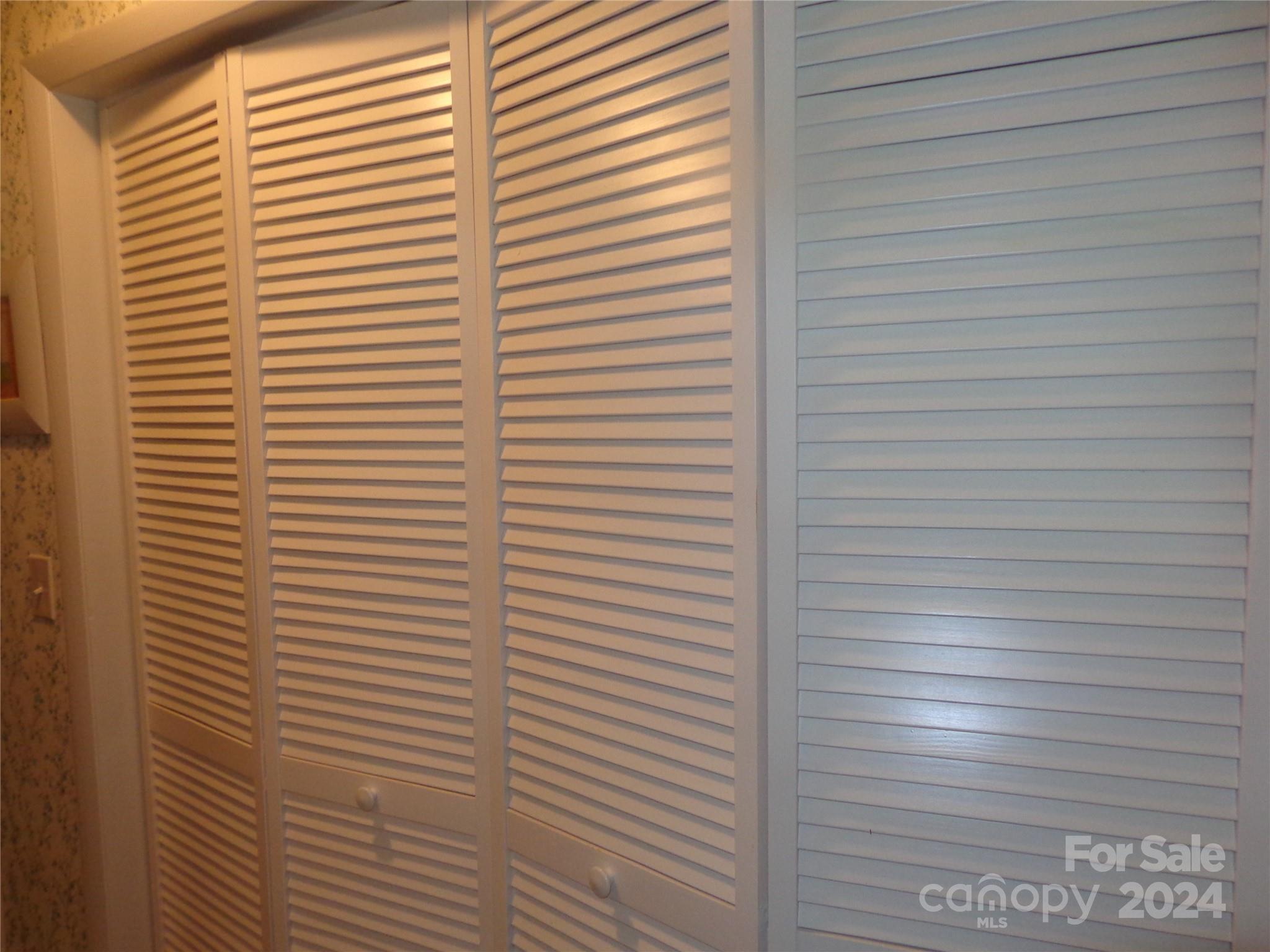 981 Rufus Robinson Road Sylva, NC 28779 - Photo 15 of 27 a view of a room with a wooden wall