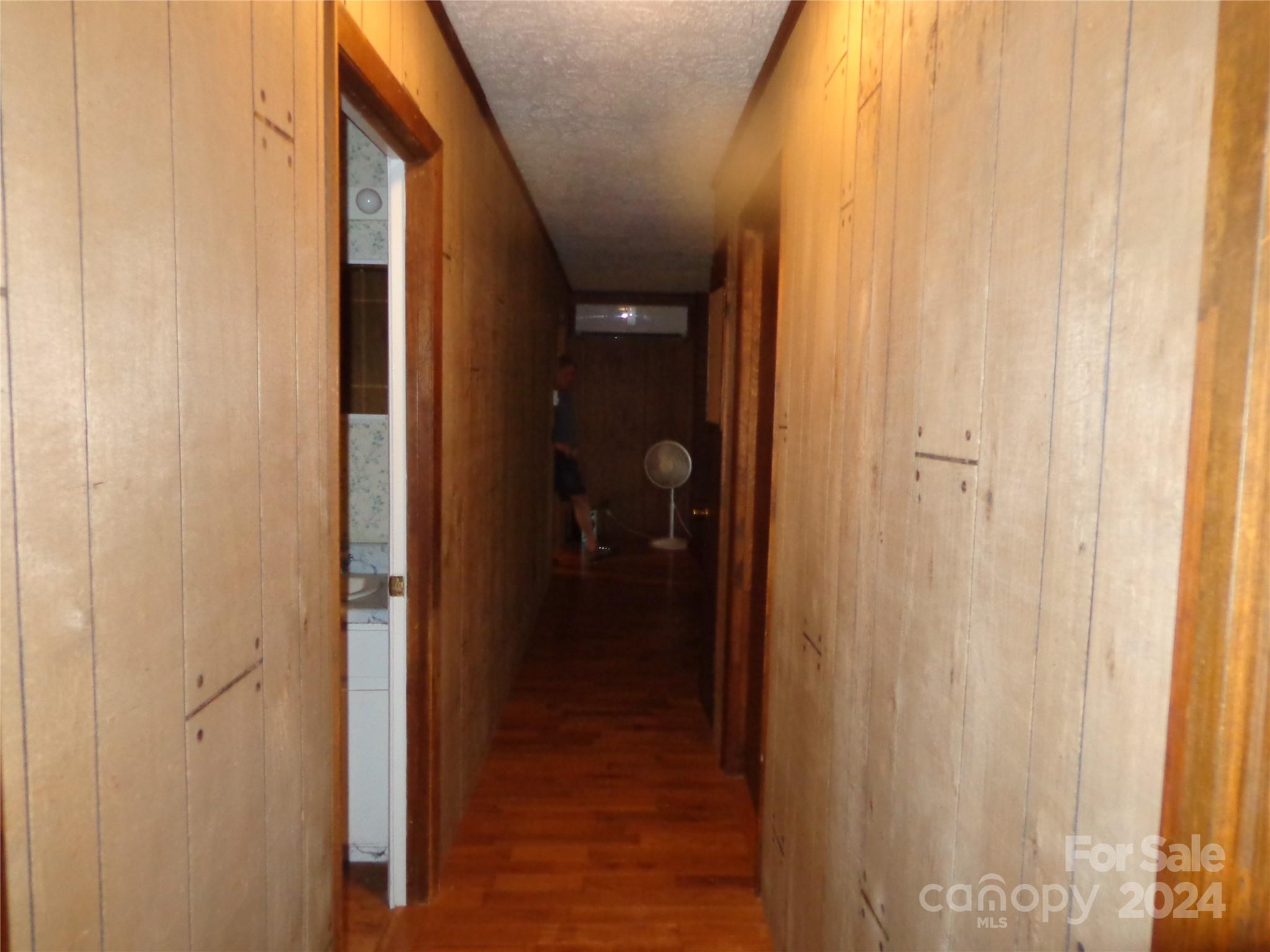981 Rufus Robinson Road Sylva, NC 28779 - Photo 10 of 27 a view of a bathroom from a hallway