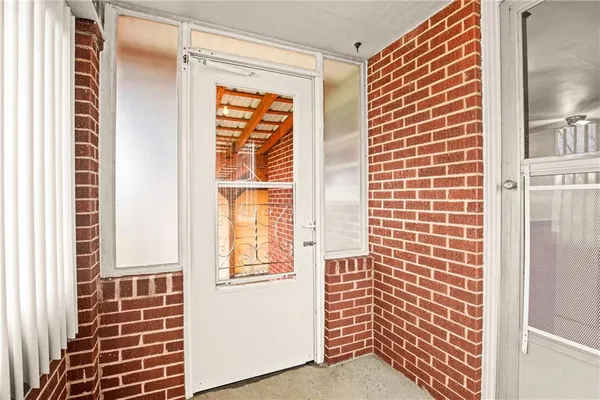 a view of wooden floor and a cabinet