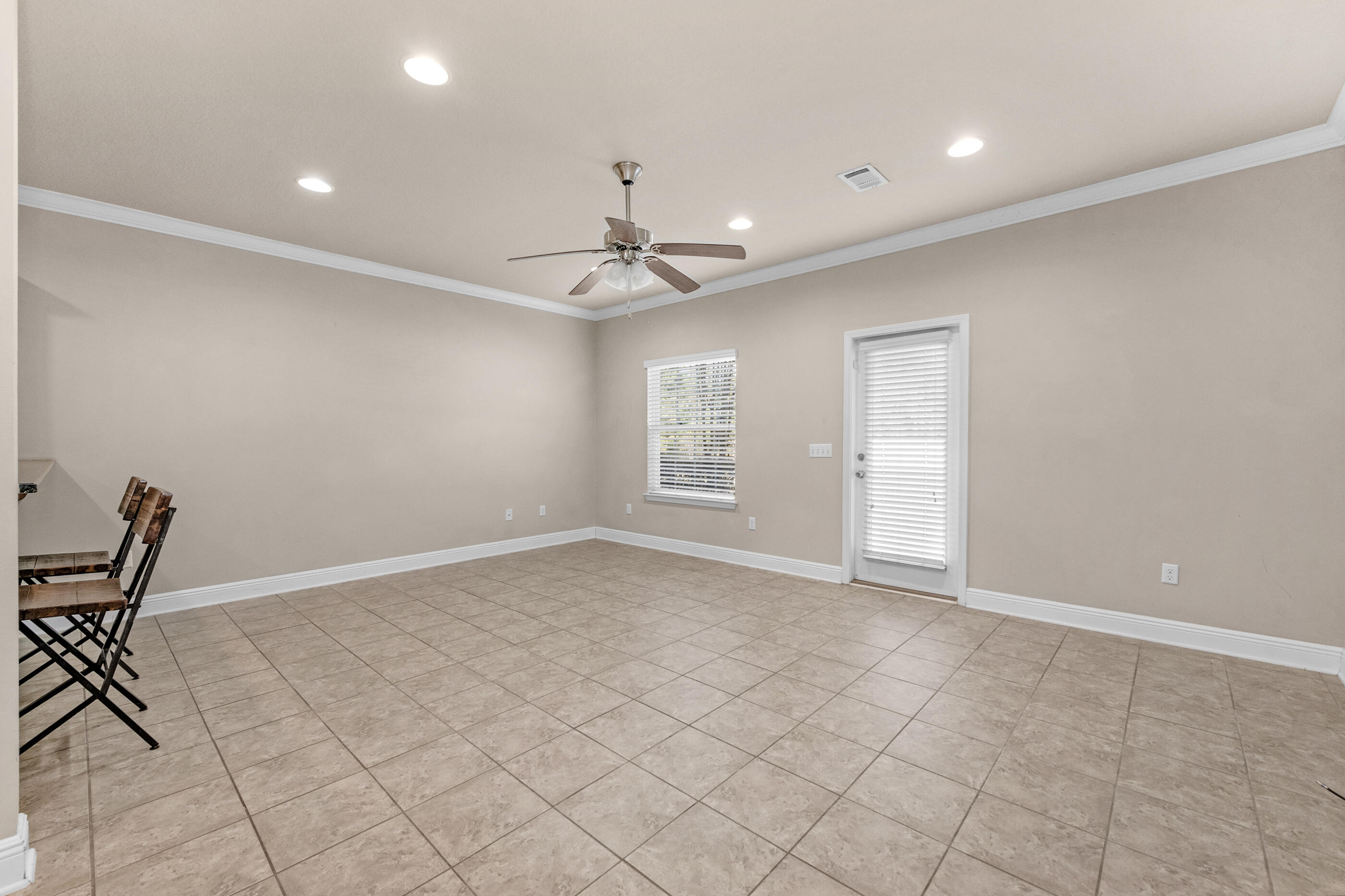 19 East Shady Oaks Lane, Unit E Santa Rosa Beach, FL 32459 - Photo 12 of 33 a view of an empty room with a window