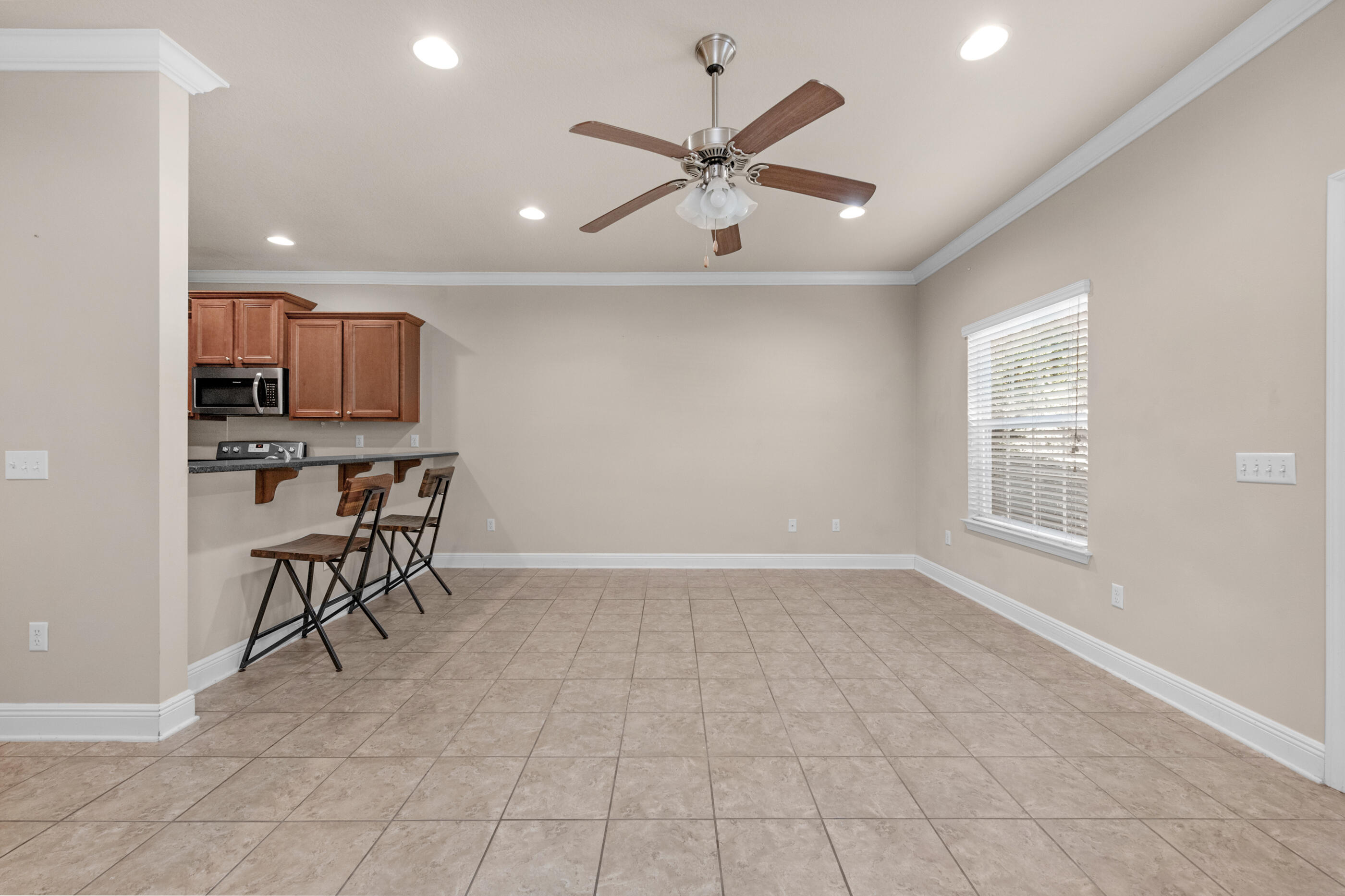 19 East Shady Oaks Lane, Unit E Santa Rosa Beach, FL 32459 - Photo 13 of 33 a view of a livingroom with furniture and a ceiling fan