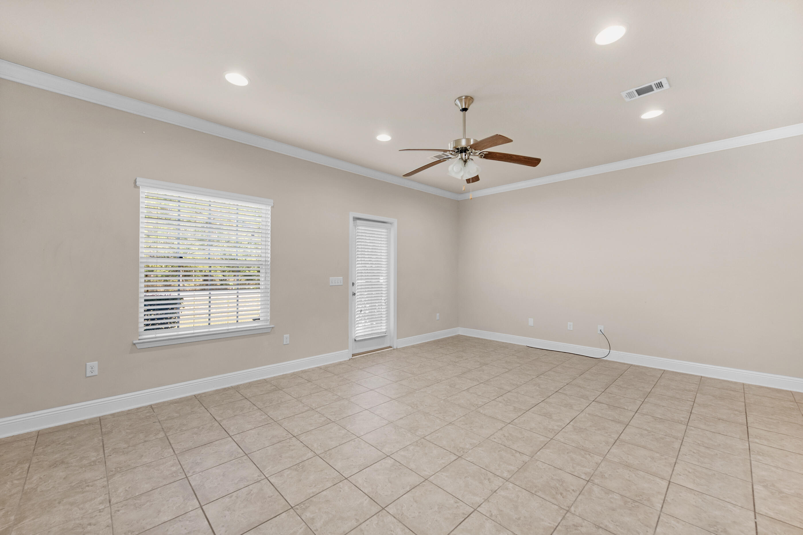 19 East Shady Oaks Lane, Unit E Santa Rosa Beach, FL 32459 - Photo 18 of 33 a view of an empty room with a window