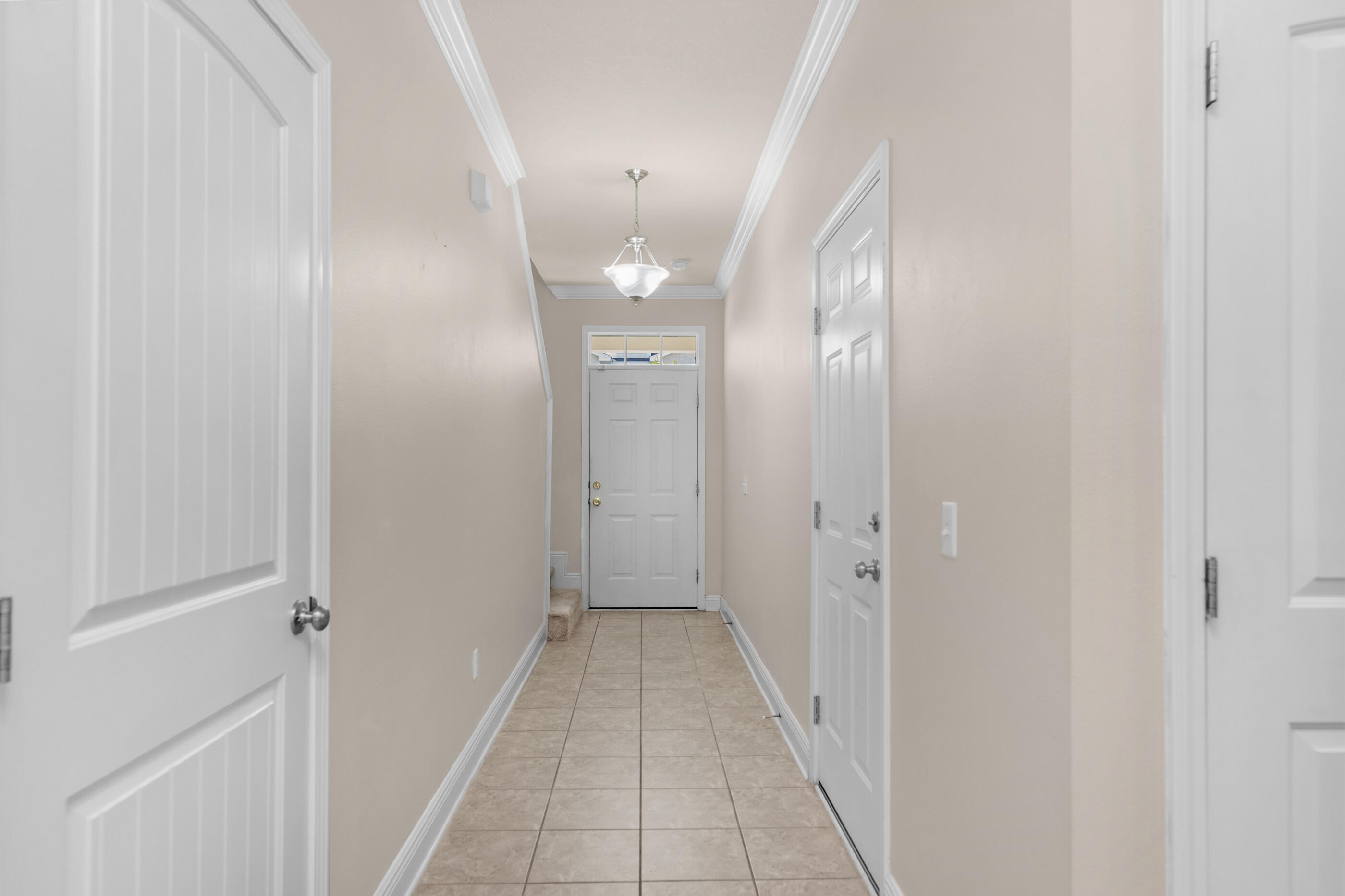 19 East Shady Oaks Lane, Unit E Santa Rosa Beach, FL 32459 - Photo 19 of 33 a view of a hallway with wooden floor