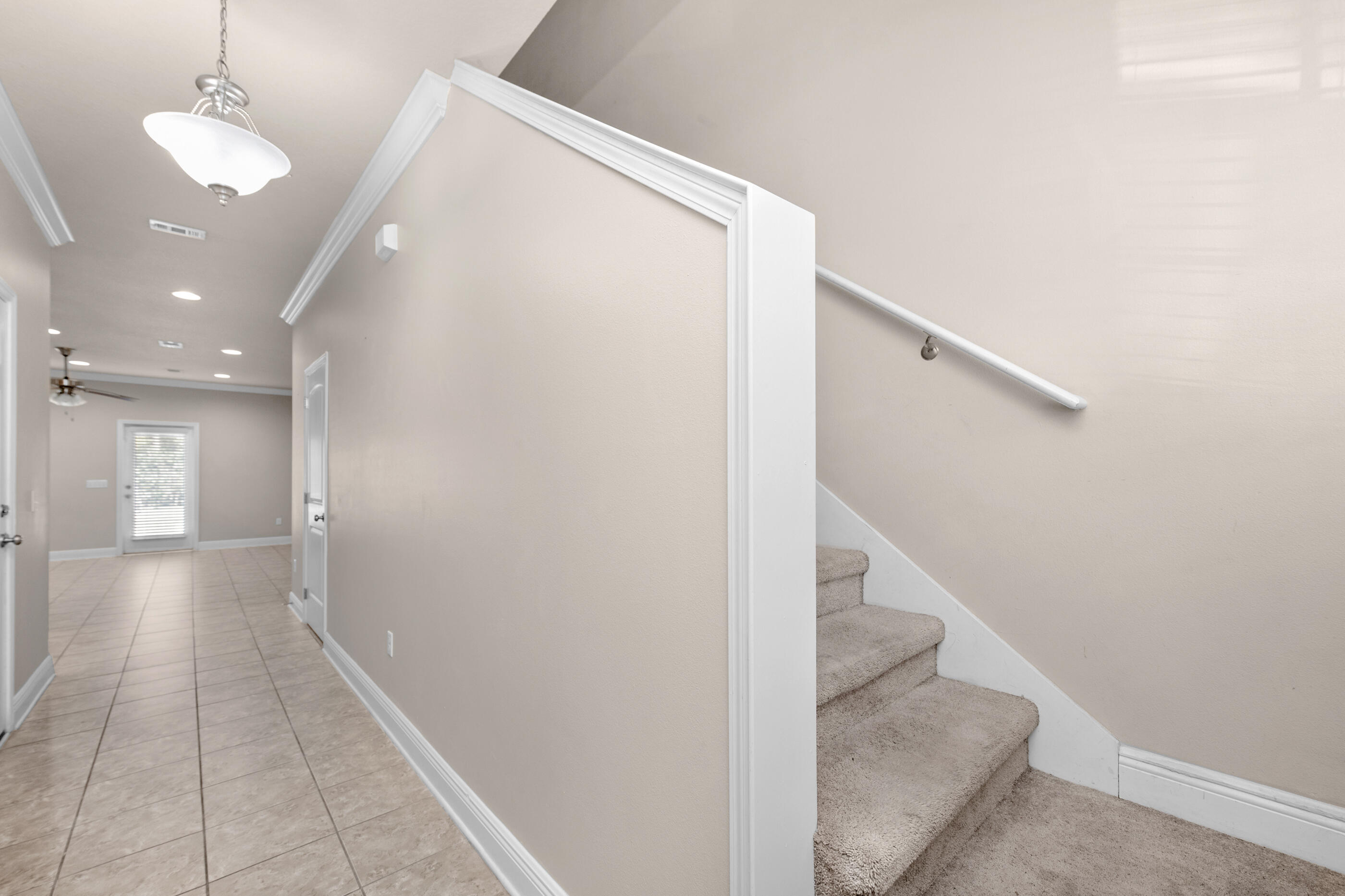 19 East Shady Oaks Lane, Unit E Santa Rosa Beach, FL 32459 - Photo 20 of 33 a view of a hallway with a white walls