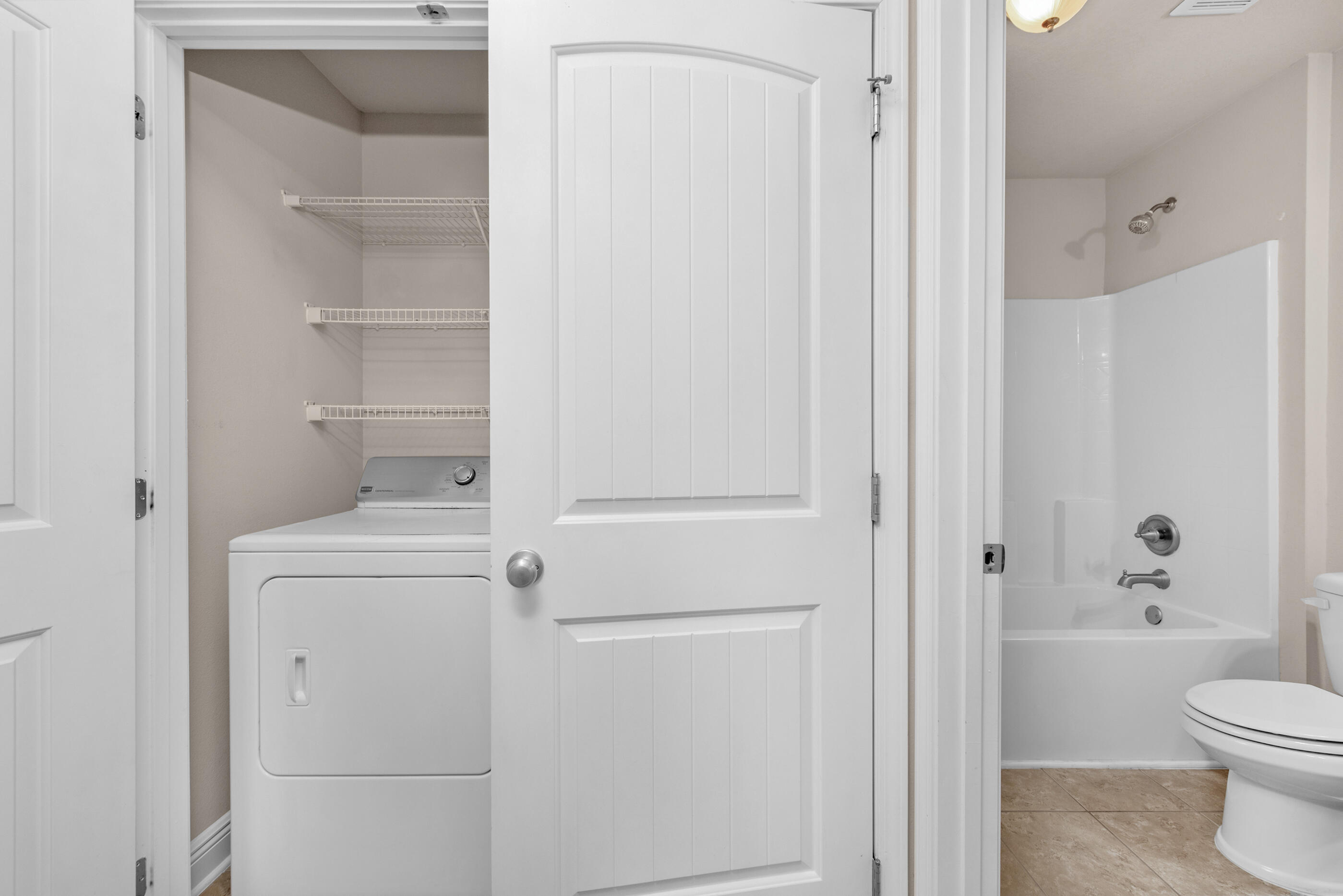 19 East Shady Oaks Lane, Unit E Santa Rosa Beach, FL 32459 - Photo 31 of 33 a bathroom with a shower toilet and sink