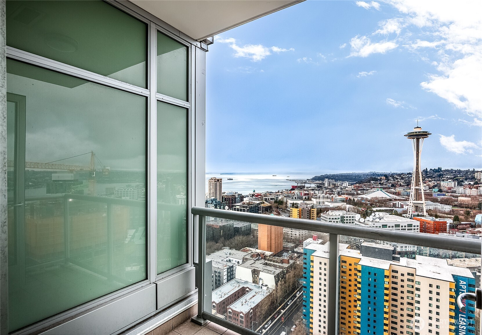 583 Battery Street, Unit 3103N Seattle, WA 98121 - Photo 23 of 39 a view of a balcony with wooden floor