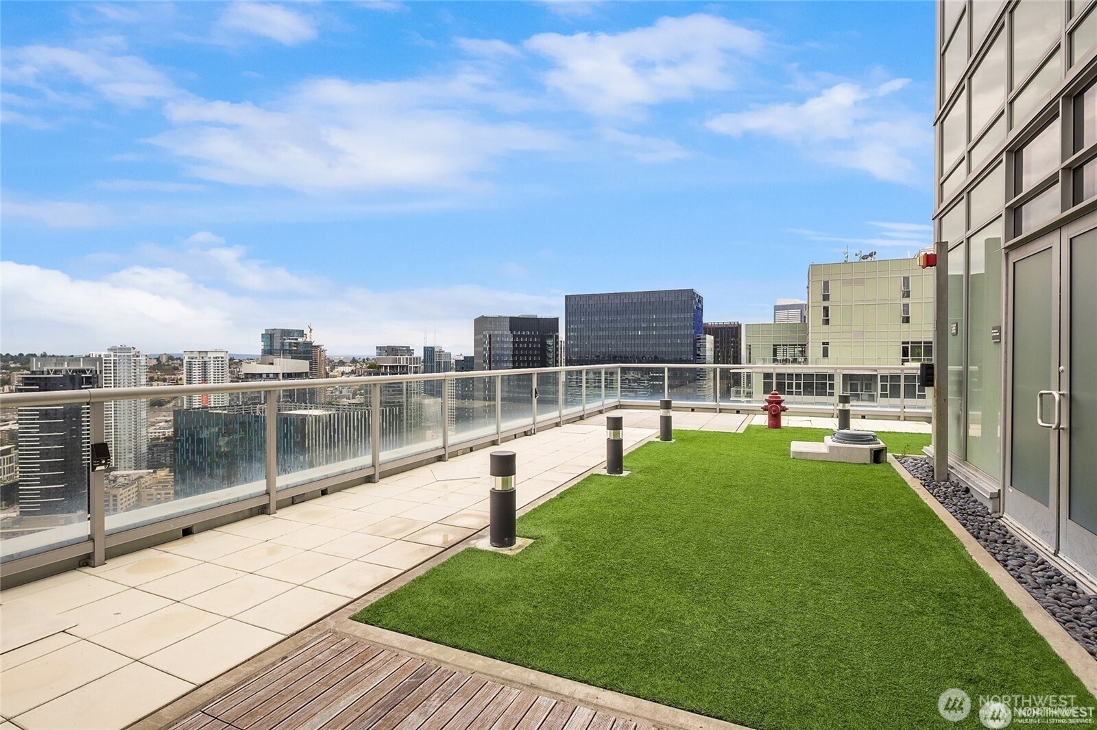 583 Battery Street, Unit 3103N Seattle, WA 98121 - Photo 39 of 39 a view of yard with swimming pool and seating