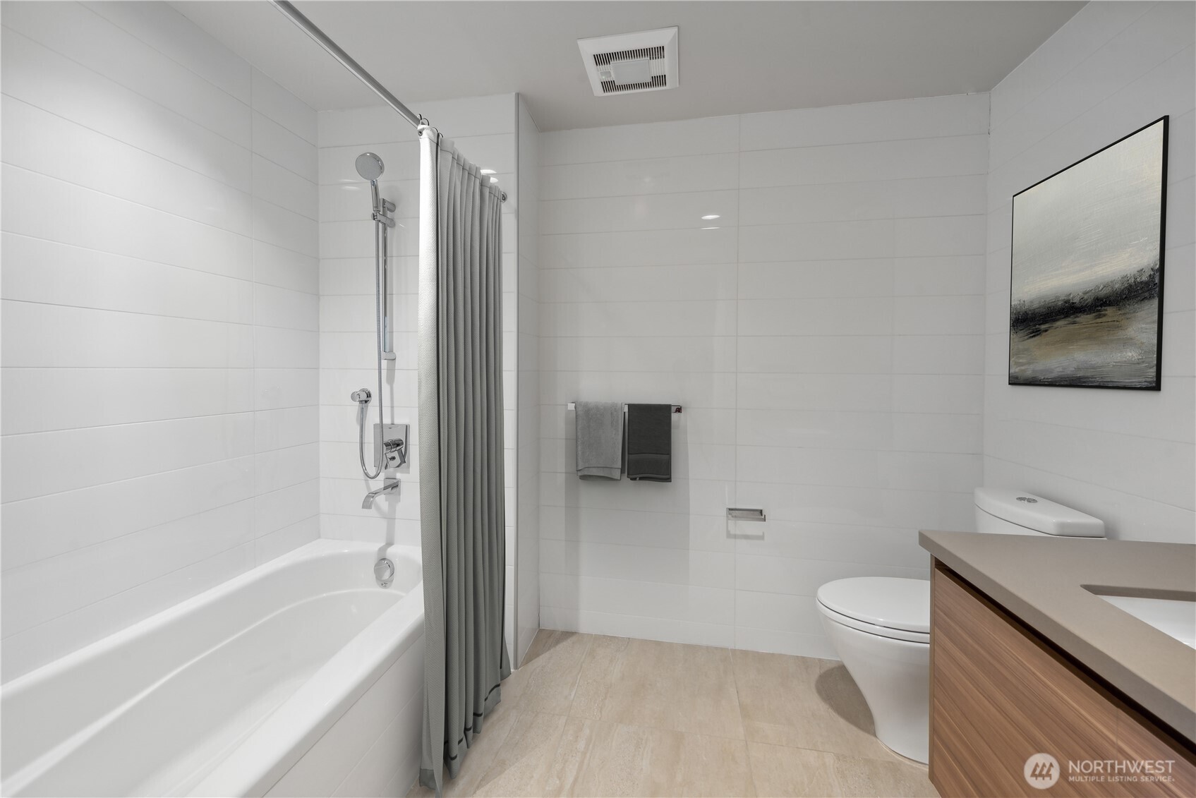 583 Battery Street, Unit 3103N Seattle, WA 98121 - Photo 8 of 39 a bathroom with a toilet a sink and bathtub