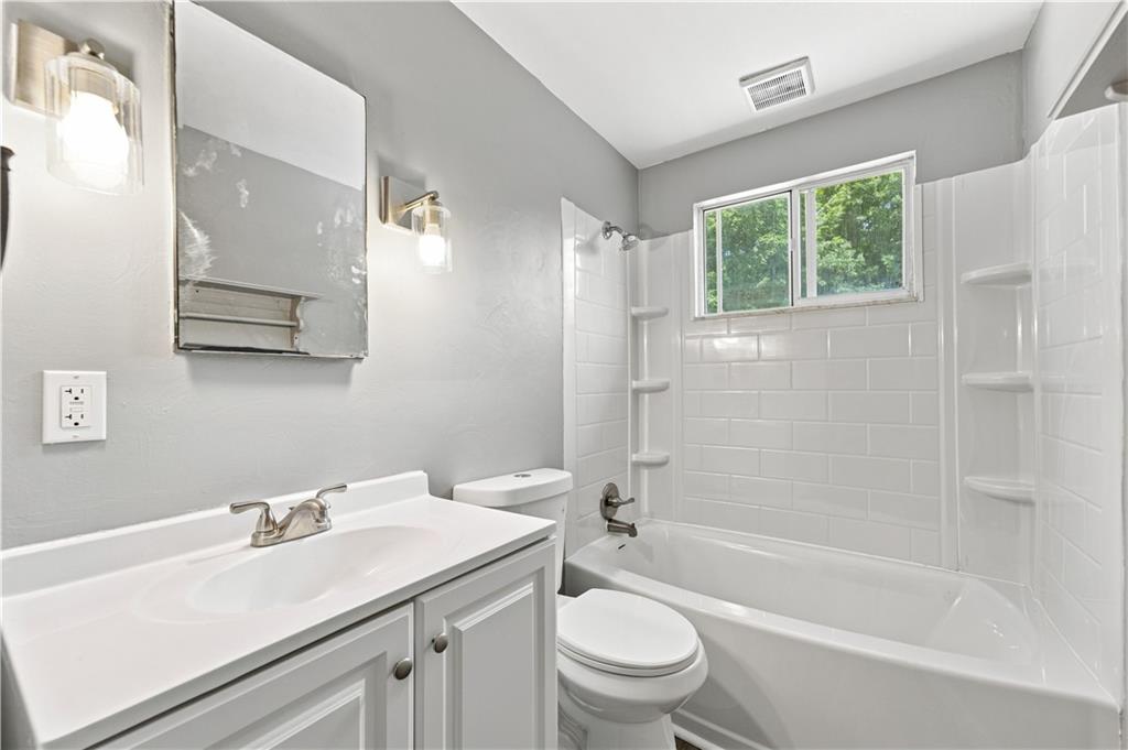 300 West Starz Road Cheswick, PA 15024 - Photo 22 of 39 Completely updated full bathroom on the main level. New vanity, lighting, toilet, flooring, tub, and paint!