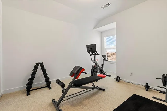 a view of workspace with gym equipment