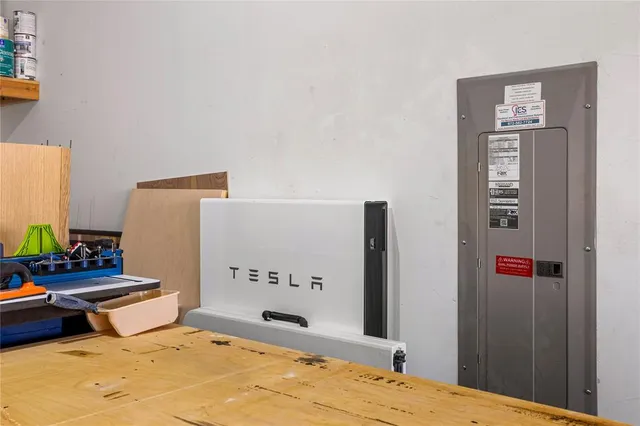 a bedroom with bed and a window