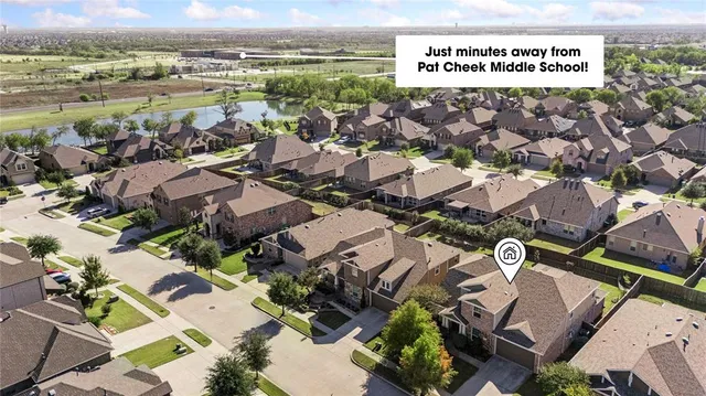 an aerial view of a city with lots of residential buildings