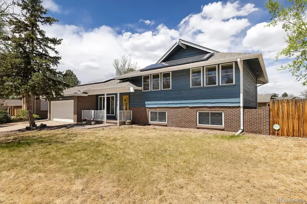 a front view of a house with a patio