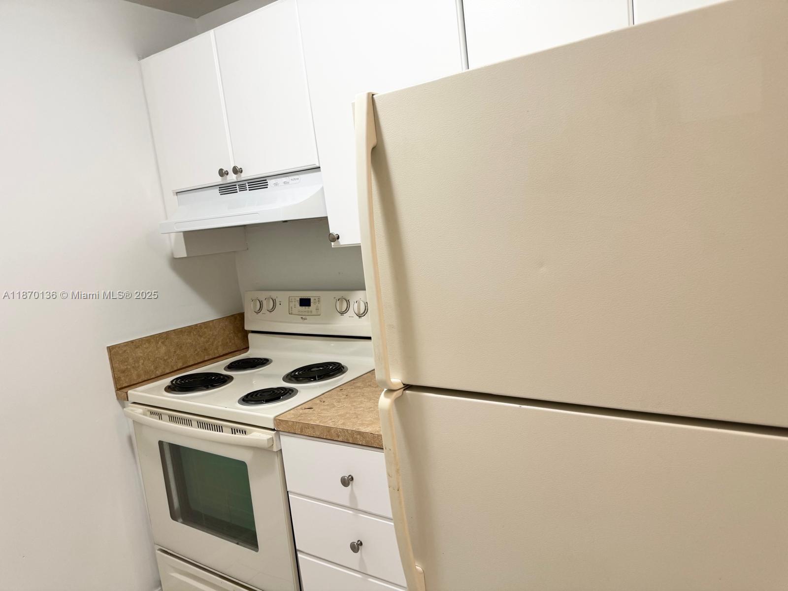 8500 Southwest 109th Avenue, Unit 6118 Miami, FL 33173 - Photo 9 of 15 a view of storage and utility room with washer and dryer