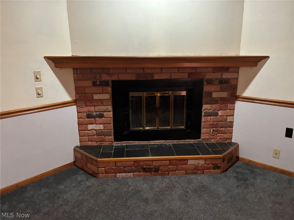 5040 2nd Street Northwest Canton, OH 44708 - Photo 22 of 45 Family room fireplace