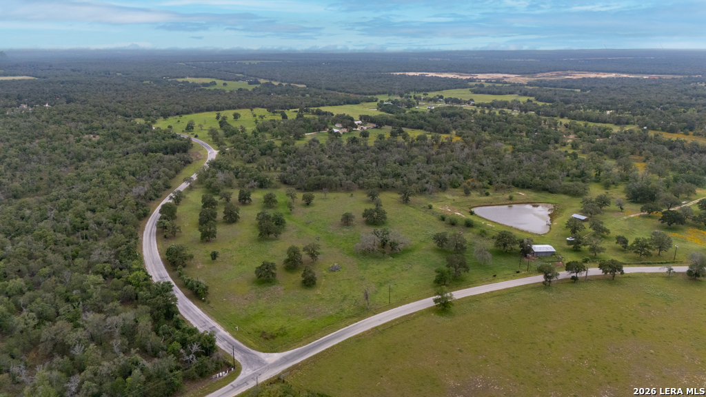 104 Longhorn Road Stockdale, TX 78160 - Photo 36 of 47 an aerial view of a residential houses with outdoor space